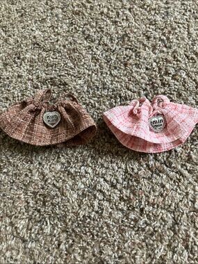 Pair of Pink and brown doll dresses with heart charm